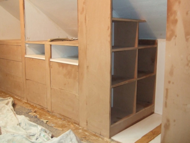 Built-in Attic Bedroom Shelves During Construction