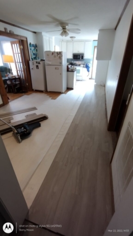 Water Damaged Dining/Kitchen Area Flooring During New Floor Install