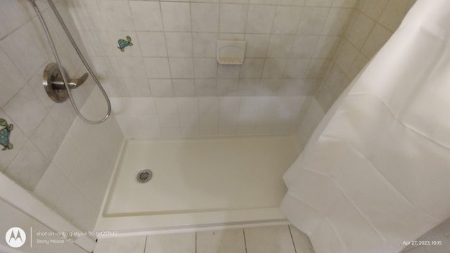 Remove bathtub and replace with low curb pan