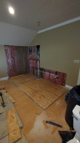 Level Floor and Cut-away Wall to Expose Plumbing