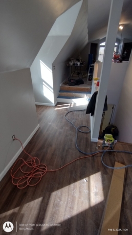 Luxury Vinyl Plank Installation in Room Over Garage