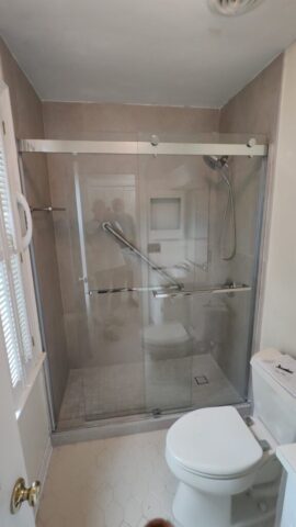 Tiling Completed, Grab bar, Shelf, Shower Trim and Glass Doors Installed Tiling Completed, Grab bar, Shelf, Shower Trim and Glass Doors Installed